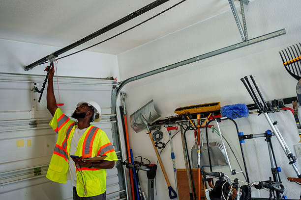 Professional Garage Door Panel Replacement technician working in Scotland County County, NC